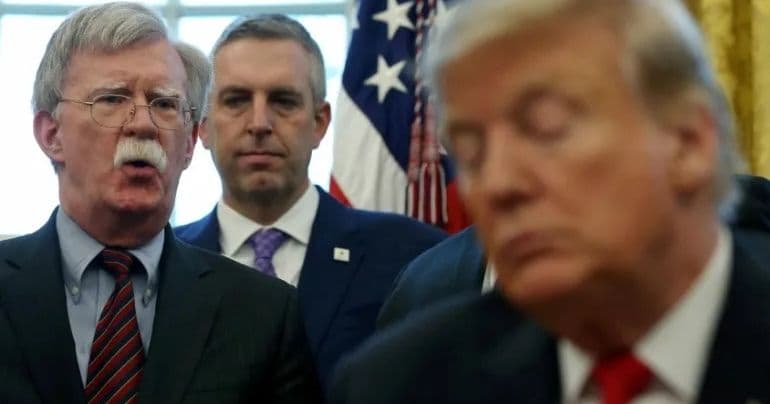 Former Trump adviser pleads guilty in classified information case.