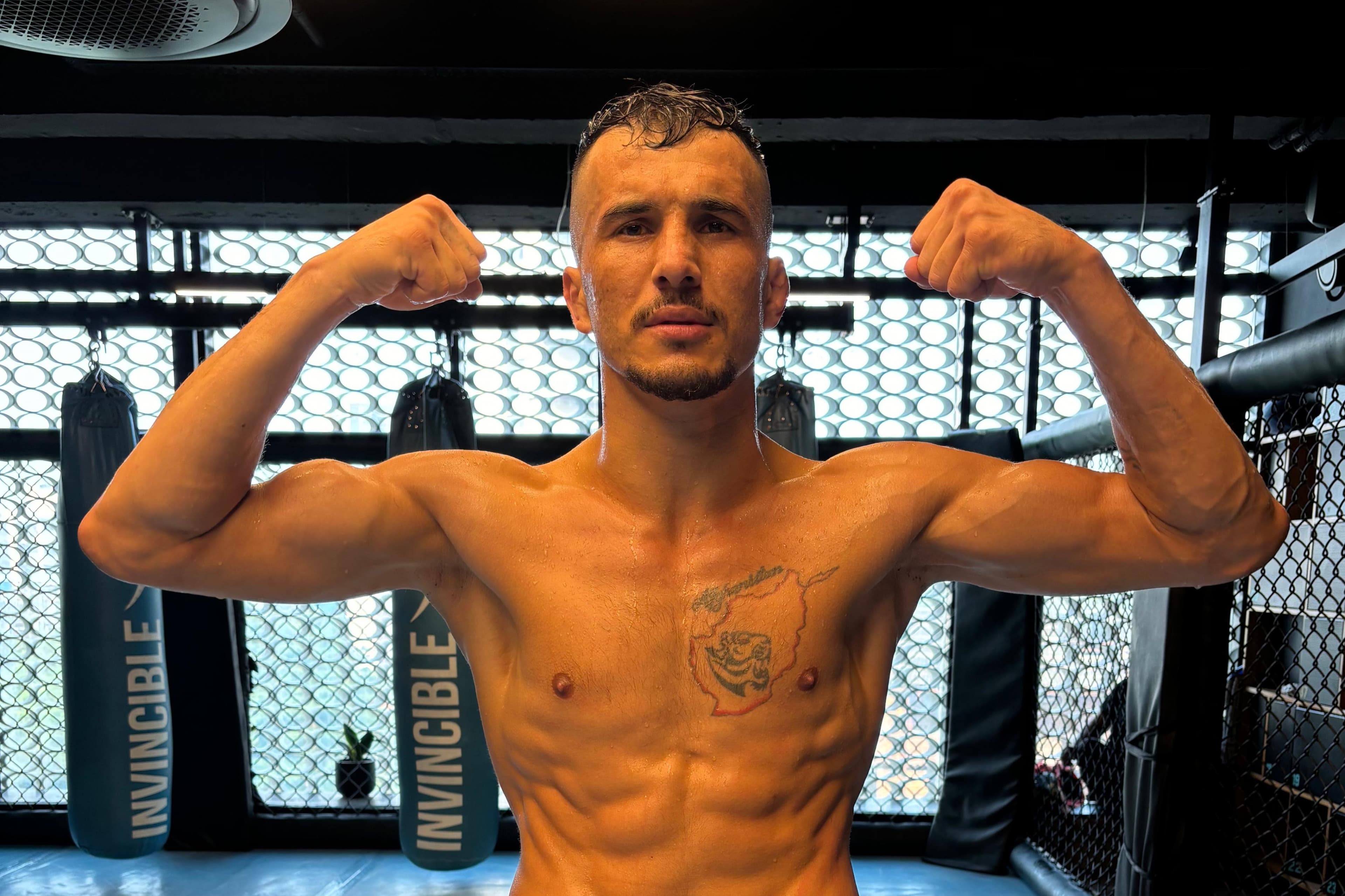 Abdulazim Badakhshi Set to face his Chinese opponent.