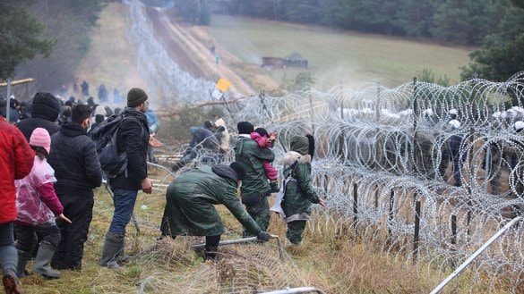 More than 80 refugees, including Afghans, were arrested at the Poland border.
