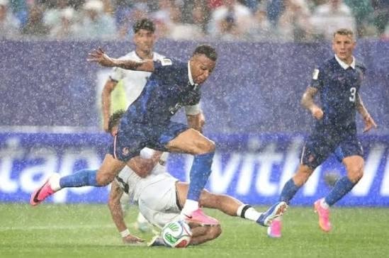 Rare suspension of the France vs Iraq match due to severe storm and lightning risk.